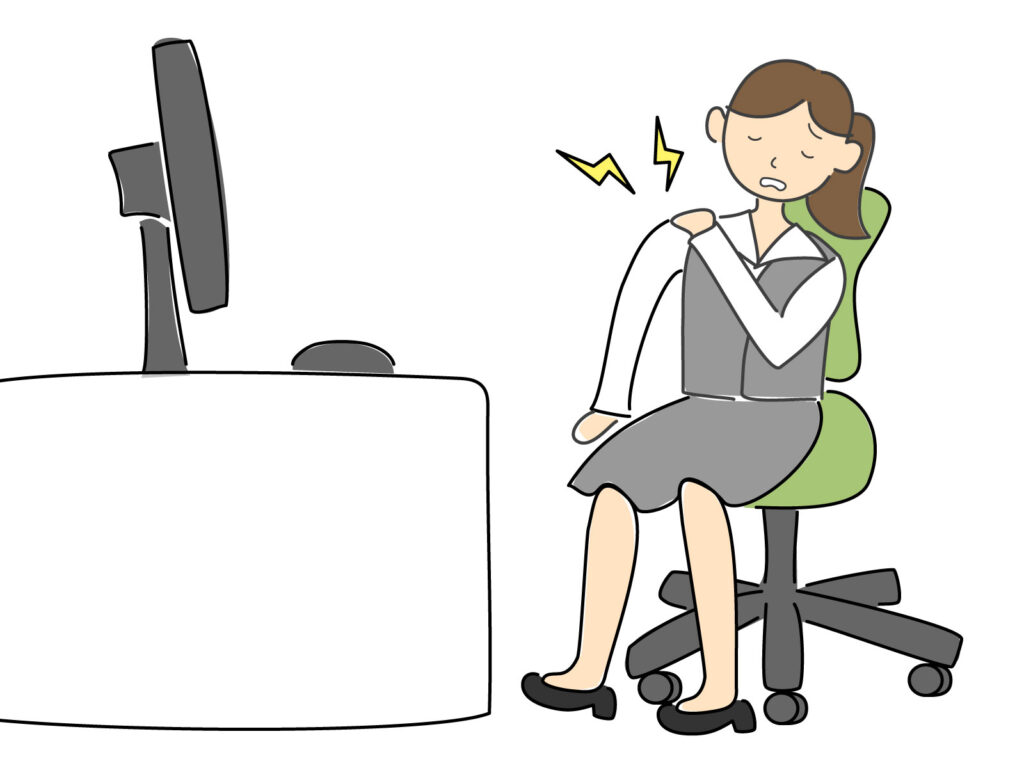 デスクワークで筋肉が硬くなっている女性